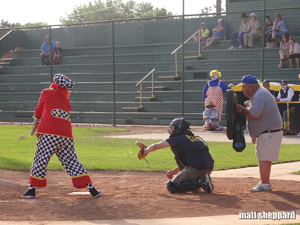 the Umpzzy appears to be hiding behind his chest protector...